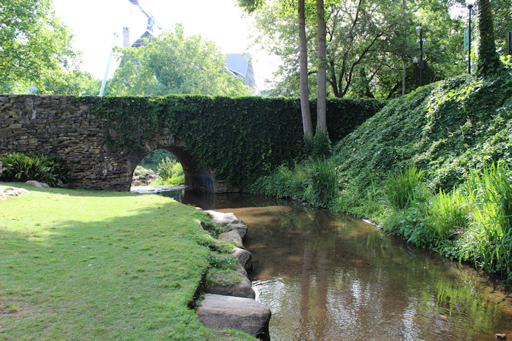 ivy covered stone bridge